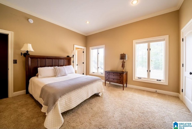 carpeted bedroom featuring ornamental molding and multiple windows