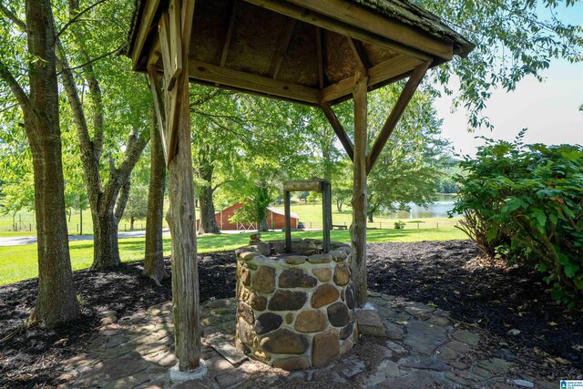 view of patio featuring a water view