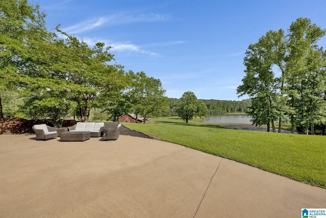 view of patio with a water view and an outdoor hangout area