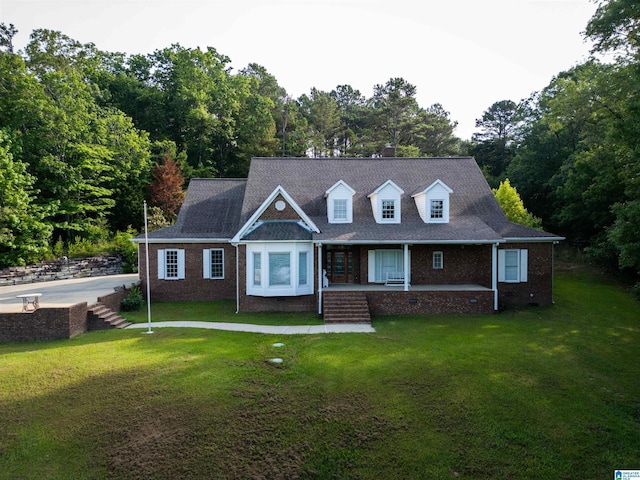 view of front facade featuring a front yard