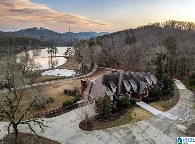 view of property's community with a water and mountain view