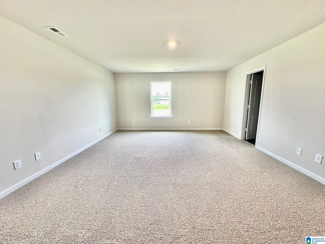 view of carpeted spare room