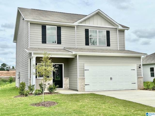 view of front of house featuring a garage and a front lawn