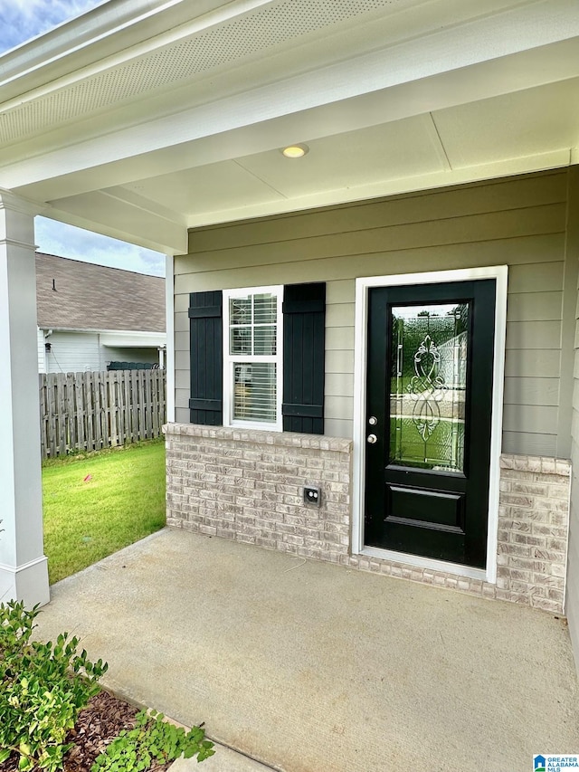 craftsman inspired home with a garage and a front lawn