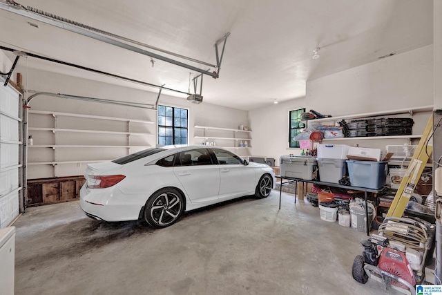 garage featuring a garage door opener