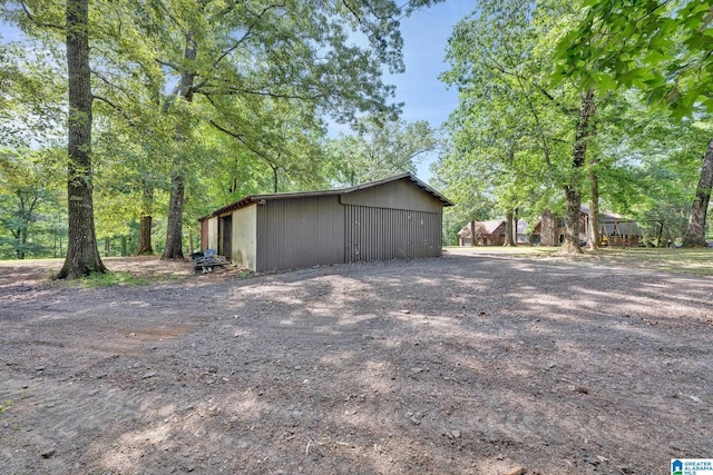 view of home's exterior featuring an outdoor structure