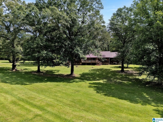 view of yard with a deck