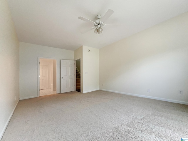 unfurnished bedroom featuring carpet flooring and ceiling fan