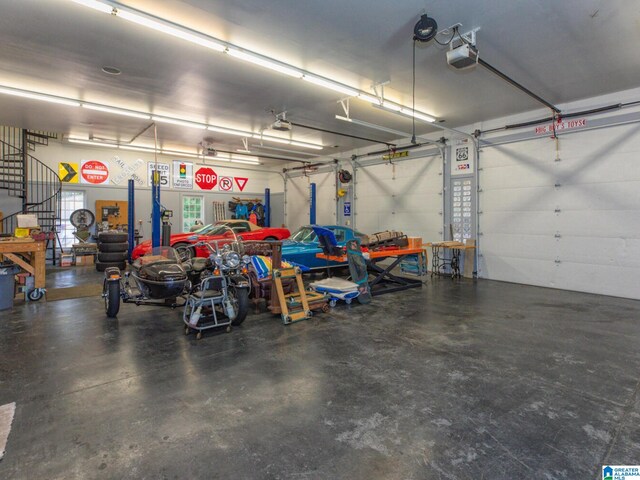 garage featuring a garage door opener