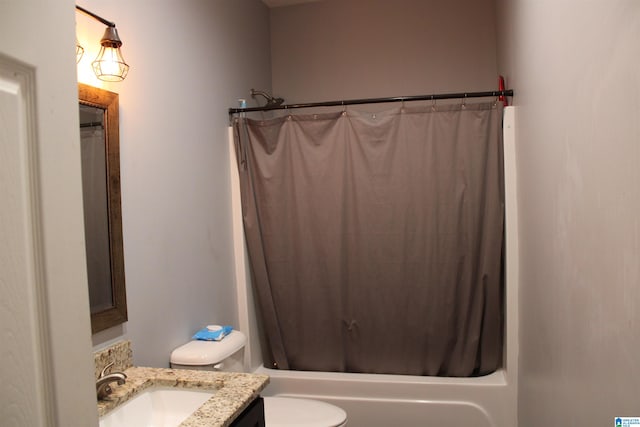 full bathroom with vanity, shower / bathtub combination with curtain, and toilet