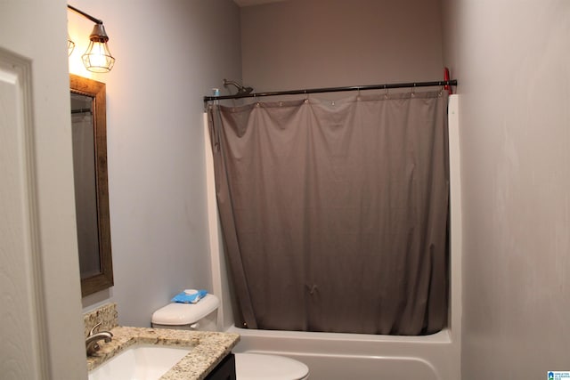 full bathroom with toilet, vanity, and shower / tub combo with curtain