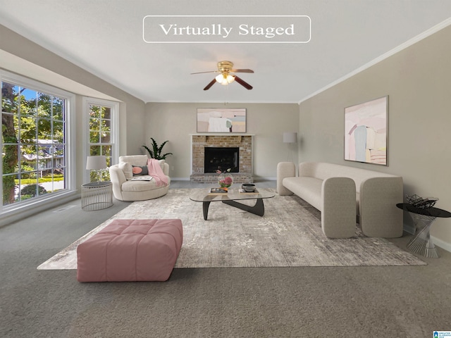 living room with a fireplace, carpet, ceiling fan, and ornamental molding