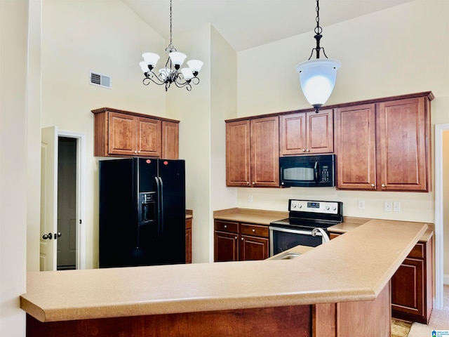 kitchen with light carpet, black appliances, a chandelier, kitchen peninsula, and high vaulted ceiling