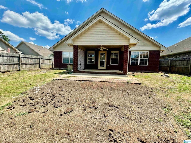 rear view of property featuring a patio area