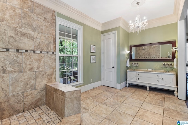 bathroom with vanity, a shower, ornamental molding, and a notable chandelier