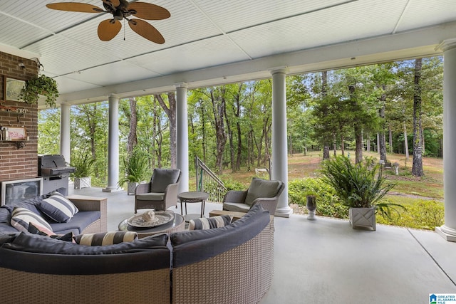 sunroom / solarium with ceiling fan and plenty of natural light