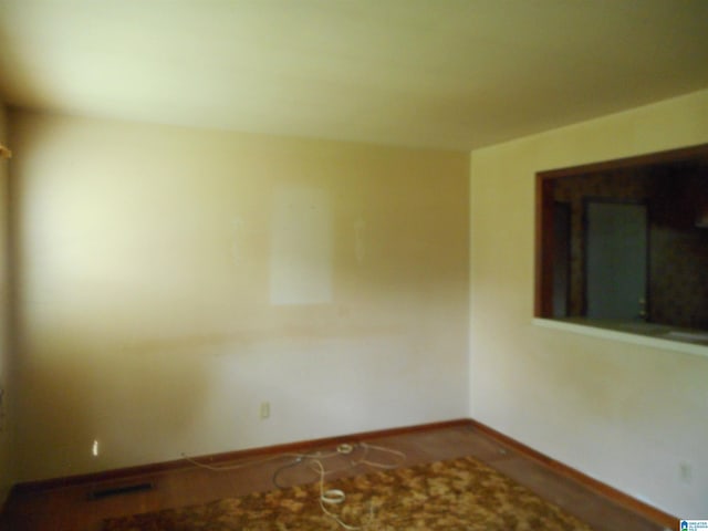 empty room with baseboards