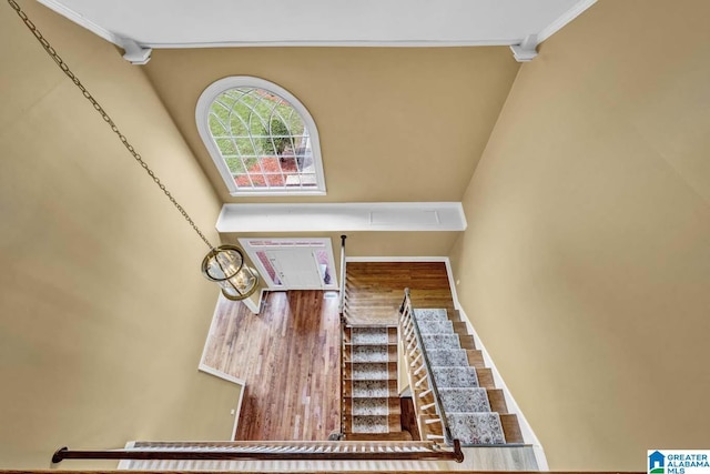 foyer featuring crown molding