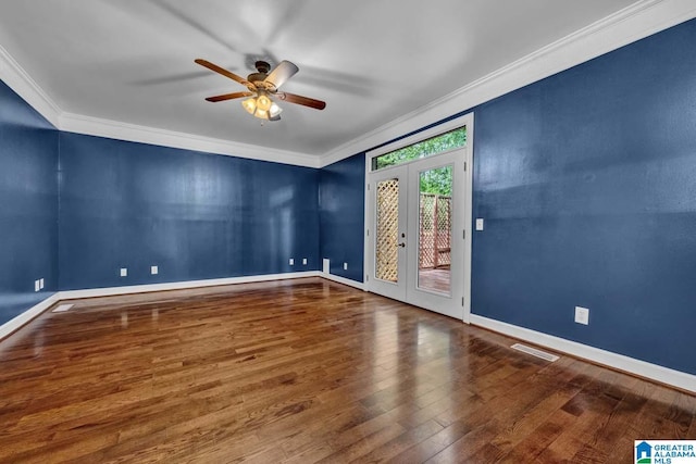 unfurnished room with hardwood / wood-style floors, ornamental molding, french doors, and ceiling fan