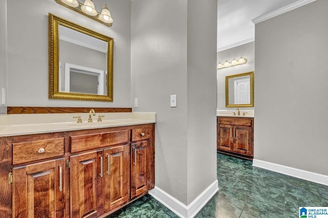 bathroom with crown molding and vanity