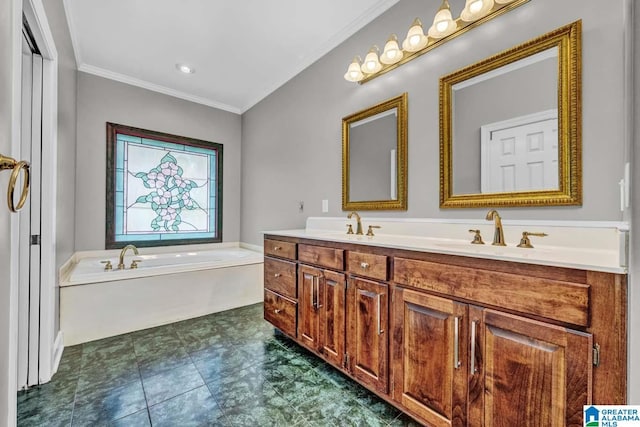 bathroom with vanity, ornamental molding, and a tub