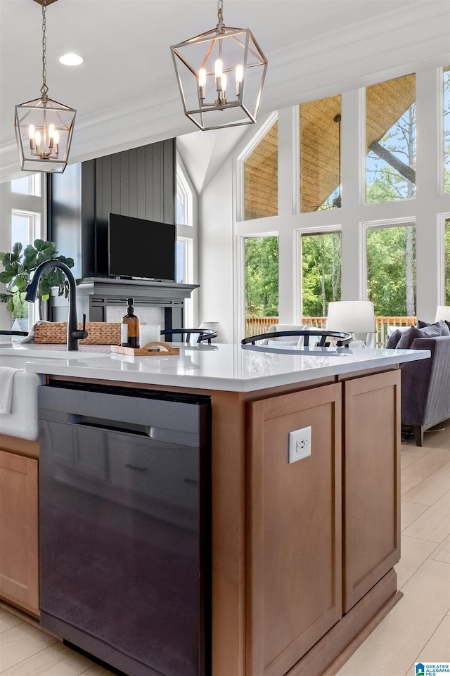 kitchen with an inviting chandelier, hanging light fixtures, and black dishwasher