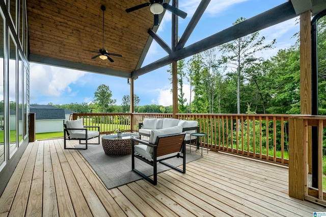 deck featuring outdoor lounge area and ceiling fan