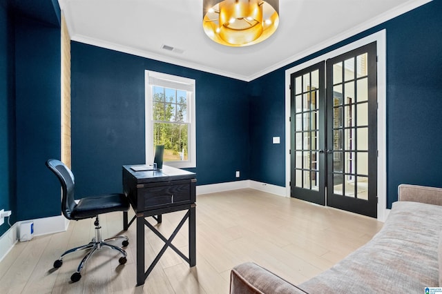 office space with french doors, crown molding, and light hardwood / wood-style floors