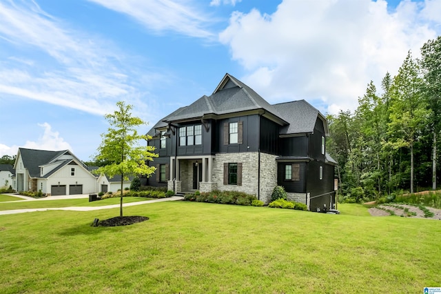 view of front facade featuring a garage and a front yard