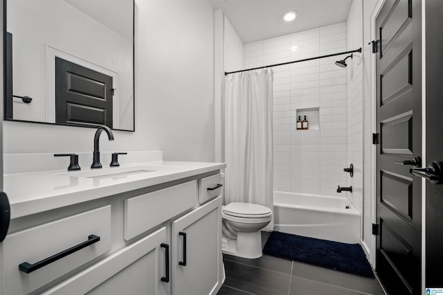 full bathroom with vanity, toilet, tile patterned flooring, and shower / tub combo