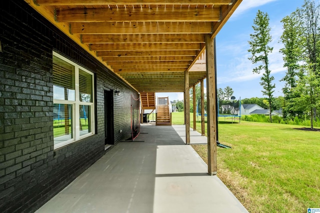 view of patio with a trampoline