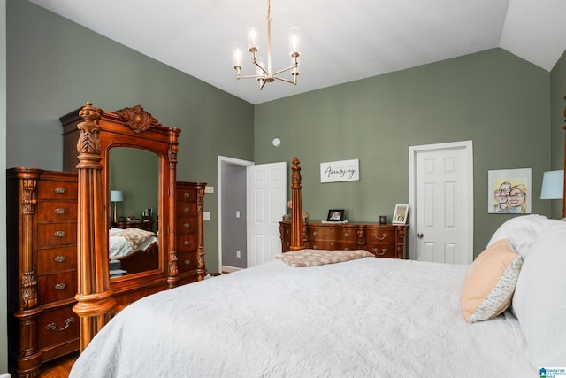 bedroom featuring lofted ceiling and a notable chandelier