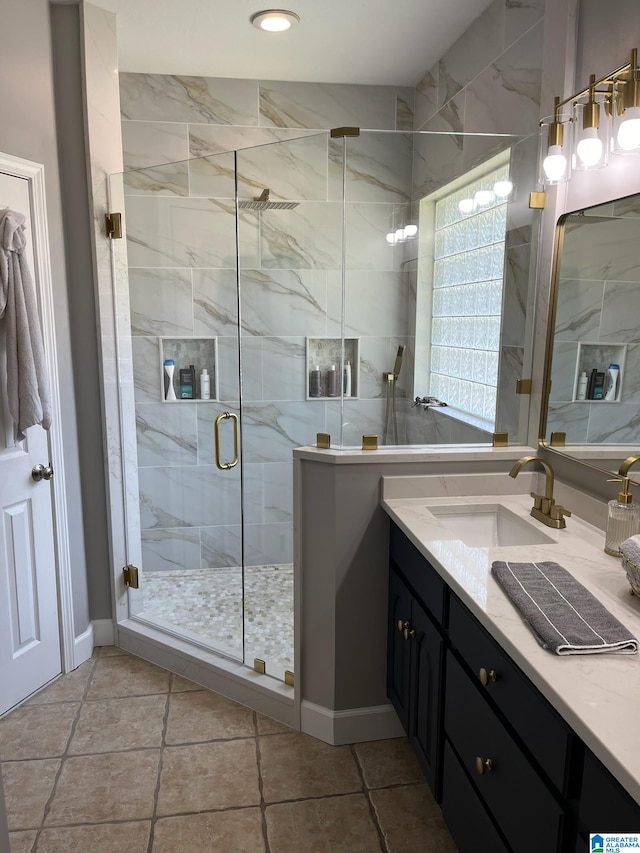 bathroom featuring vanity and walk in shower