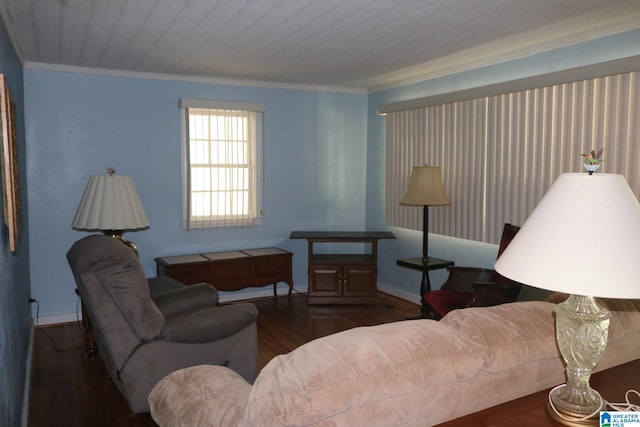 living room with crown molding and dark hardwood / wood-style floors