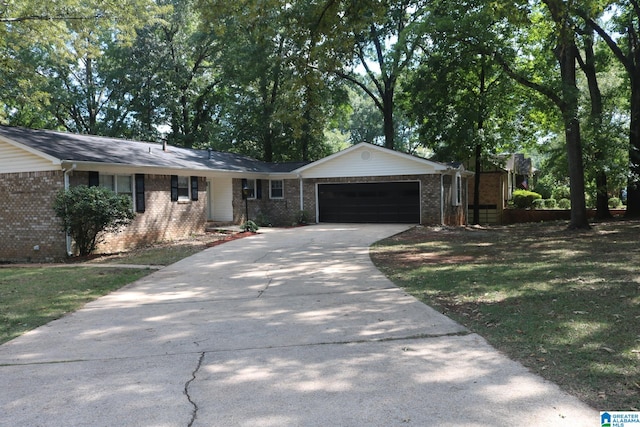 ranch-style home featuring a garage