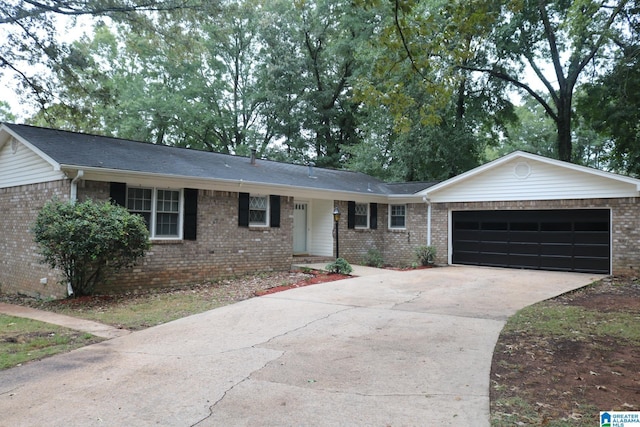 single story home featuring a garage