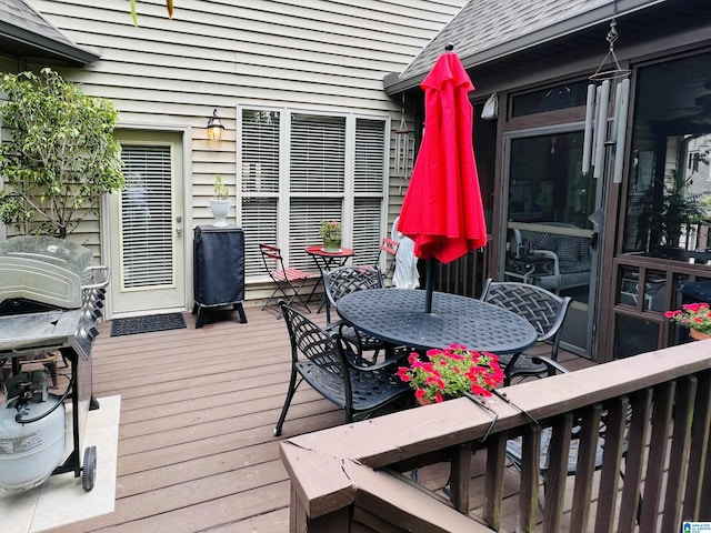 wooden deck featuring grilling area