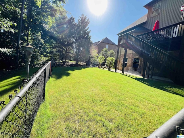 view of yard with a deck