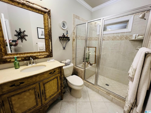 bathroom featuring tile patterned flooring, vanity, toilet, and an enclosed shower