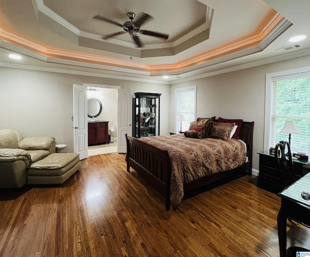 bedroom featuring multiple windows, crown molding, ceiling fan, and wood-type flooring