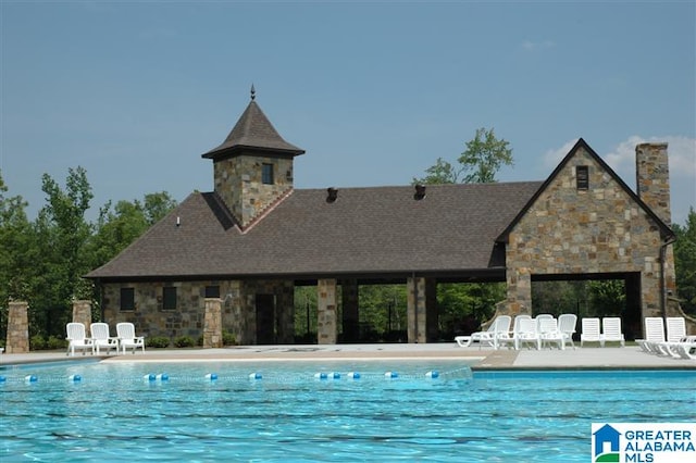 view of pool with a patio area