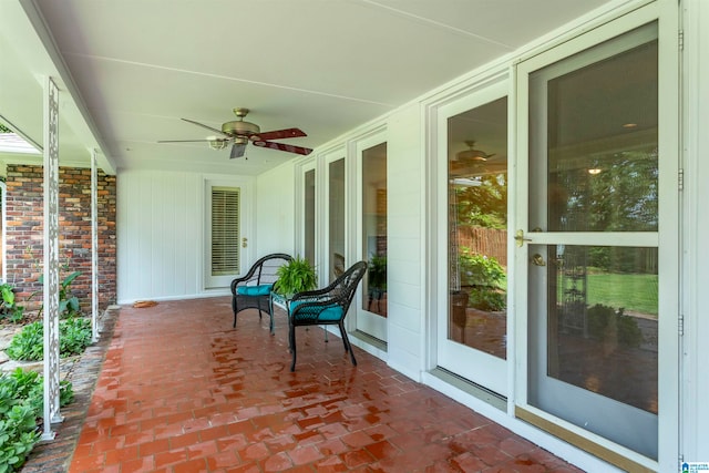 view of terrace featuring ceiling fan