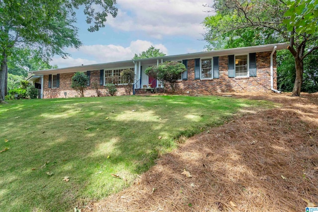 single story home with a front yard