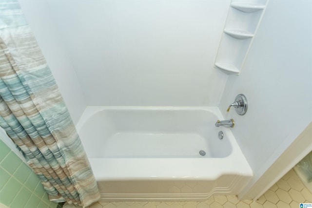 full bath with tile patterned flooring