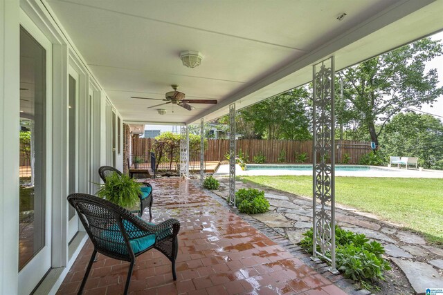 spare room with hardwood / wood-style floors, tile walls, ceiling fan, and crown molding