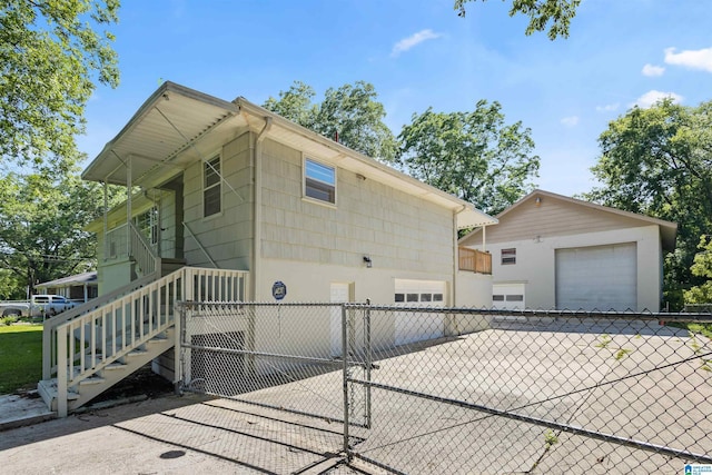 view of side of home featuring a garage