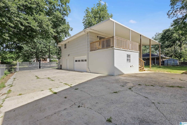 view of side of property with a garage