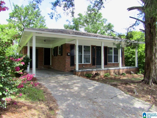 ranch-style home with a carport