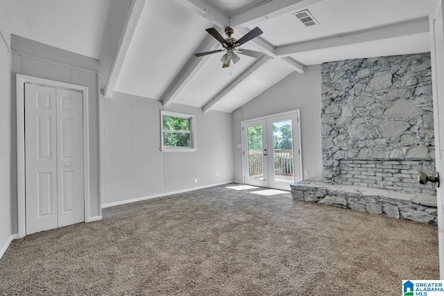 unfurnished living room featuring vaulted ceiling with beams, ceiling fan, french doors, and carpet