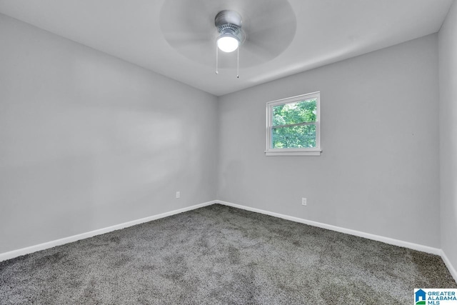 unfurnished room featuring ceiling fan and carpet floors